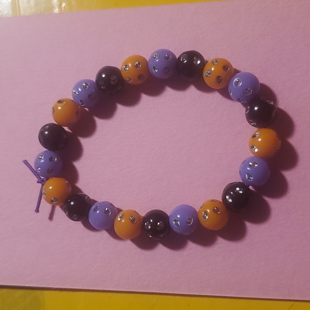 Orange,Purple and Black Bracelet with diamonds inside beads